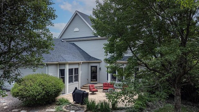 0S630 Hubbard Pl, Geneva, IL 60134 - back of property with a patio, roof with shingles, and an outdoor hangout area