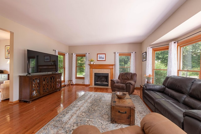 0S630 Hubbard Pl, Geneva, IL 60134 - living room with wood finished floors, plenty of natural light, and a tiled fireplace