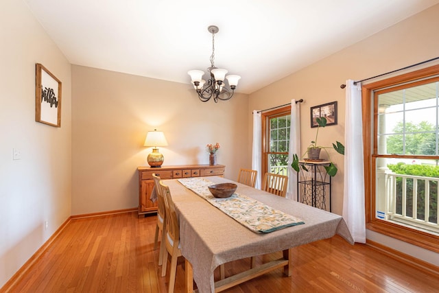0S630 Hubbard Pl, Geneva, IL 60134 - dining space with a chandelier and light wood-style flooring