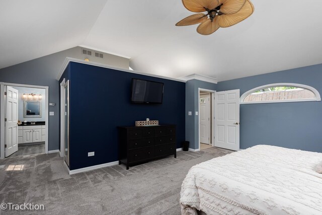 2609 Dougall Rd, Joliet, IL 60433 - carpeted bedroom featuring lofted ceiling, baseboards, and connected bathroom