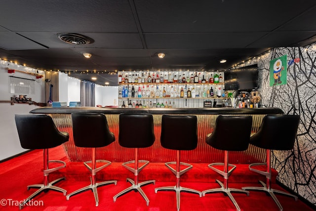 2609 Dougall Rd, Joliet, IL 60433 - indoor dry bar with carpet and a paneled ceiling