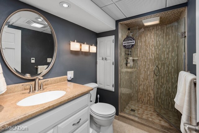 2609 Dougall Rd, Joliet, IL 60433 - bathroom featuring toilet, a stall shower, vanity, tile patterned flooring, and recessed lighting
