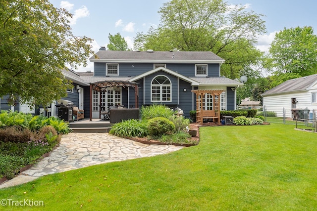 2609 Dougall Rd, Joliet, IL 60433 - back of property with a pergola, a wooden deck, and a chimney