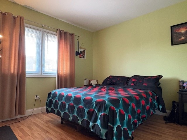 10811 S Keating Ave Unit 3Se, Oak Lawn, IL 60453 - bedroom featuring wood finished floors and baseboards