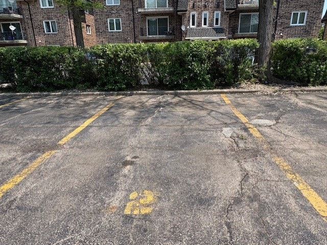 10811 S Keating Ave Unit 3Se, Oak Lawn, IL 60453 - view of uncovered parking lot