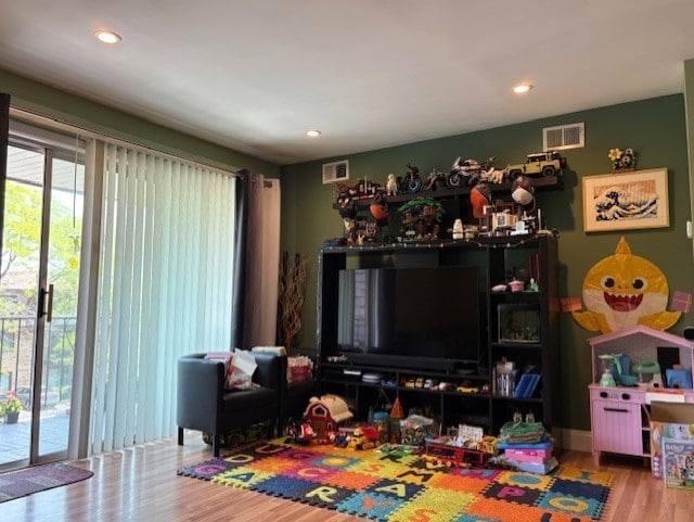 10811 S Keating Ave Unit 3Se, Oak Lawn, IL 60453 - playroom with wood finished floors and recessed lighting