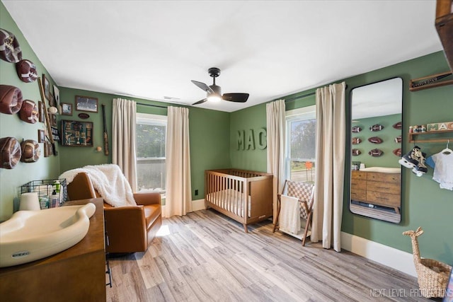 721 S Batavia Ave, Batavia, IL 60510 - bedroom with wood finished floors and a ceiling fan