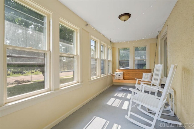 721 S Batavia Ave, Batavia, IL 60510 - sunroom featuring baseboards