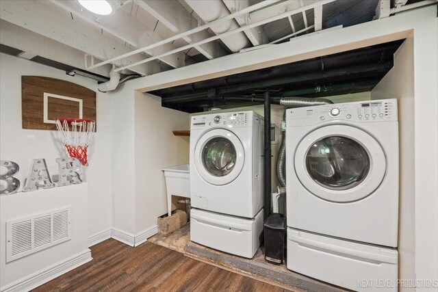 721 S Batavia Ave, Batavia, IL 60510 - laundry room with washer and clothes dryer and dark wood-type flooring