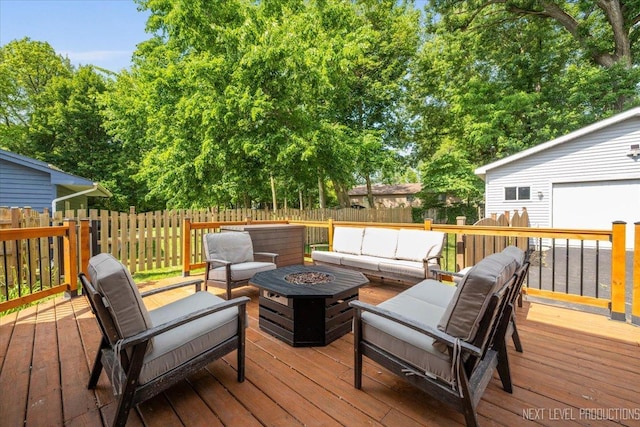 721 S Batavia Ave, Batavia, IL 60510 - deck featuring an outdoor living space with a fire pit