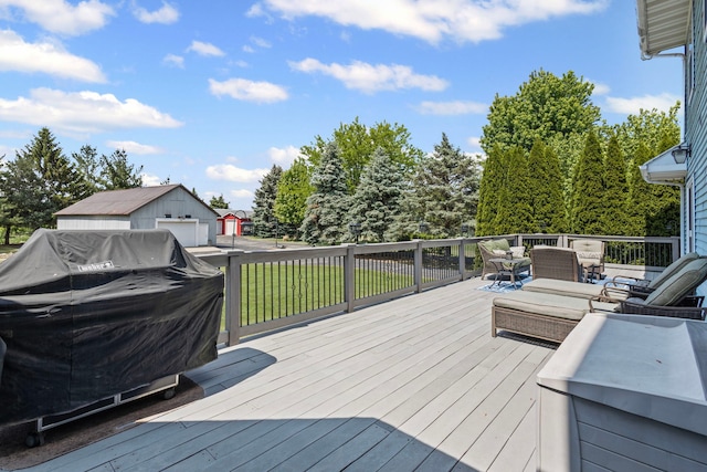 6897 Galena Rd, Bristol, IL 60512 - wooden deck with a detached garage and an outdoor living space