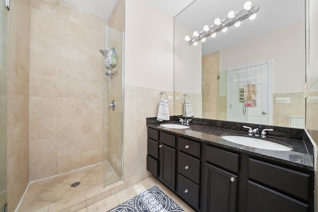 851 W Fletcher St Unit 2, Chicago, IL 60657 - full bath featuring double vanity, tile walls, tile patterned floors, and tiled shower