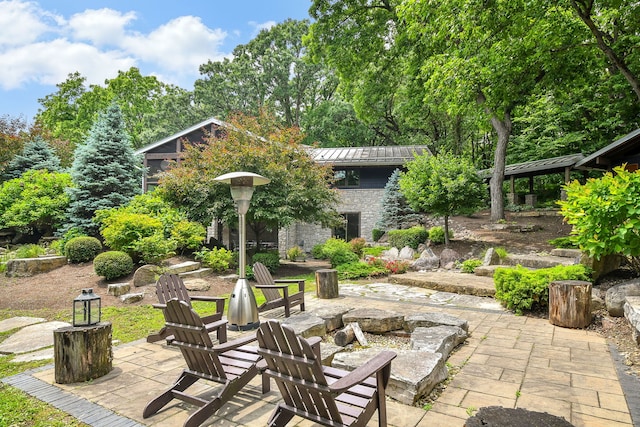 4N650 Pheasant Run Dr, Saint Charles, IL 60175 - view of patio featuring a fire pit