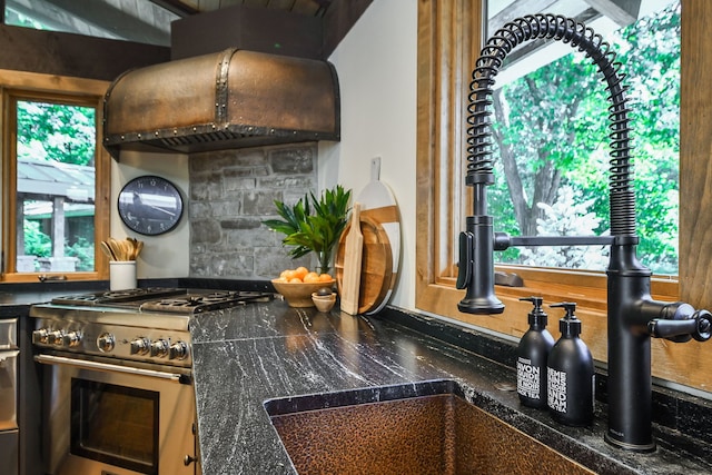 4N650 Pheasant Run Dr, Saint Charles, IL 60175 - kitchen featuring stainless steel gas range, dark countertops, and custom exhaust hood