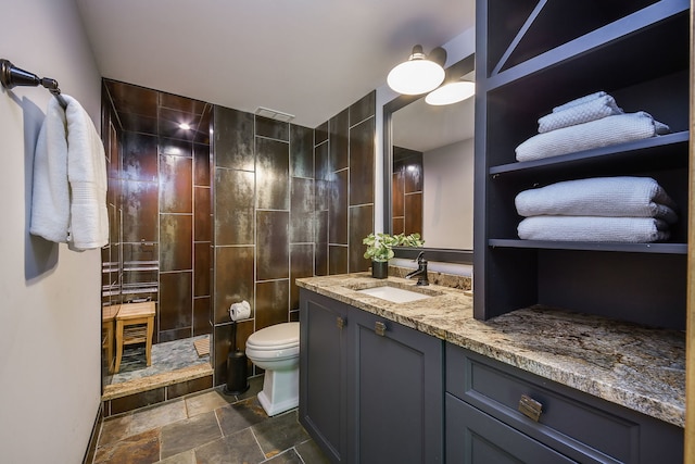 4N650 Pheasant Run Dr, Saint Charles, IL 60175 - full bathroom featuring vanity, a walk in shower, stone finish floors, and tile walls