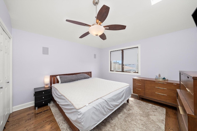 7510 Lorel Ave, Burbank, IL 60459 - bedroom featuring dark wood-type flooring, a closet, and ceiling fan