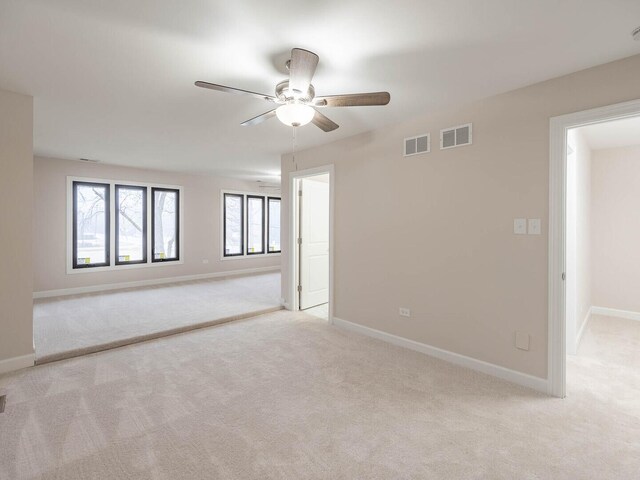 10 Cedar Creek Ct Unit A-10, Palos Heights, IL 60463 - unfurnished room featuring light colored carpet, a ceiling fan, and baseboards