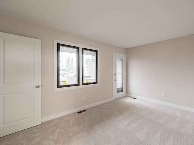 10 Cedar Creek Ct Unit A-10, Palos Heights, IL 60463 - unfurnished room featuring light carpet and baseboards