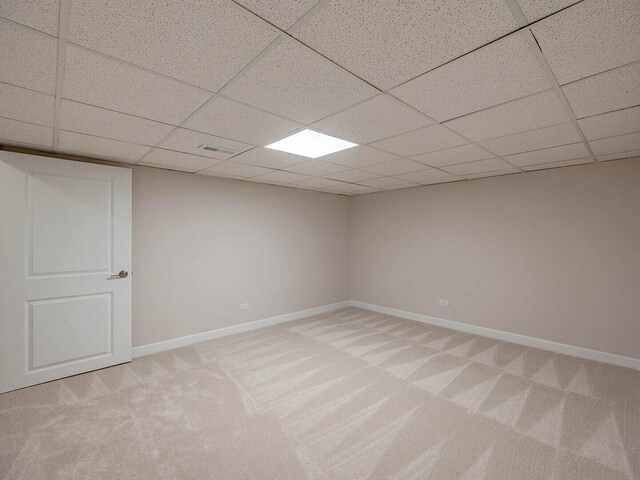 10 Cedar Creek Ct Unit A-10, Palos Heights, IL 60463 - finished below grade area with light carpet, baseboards, and a drop ceiling