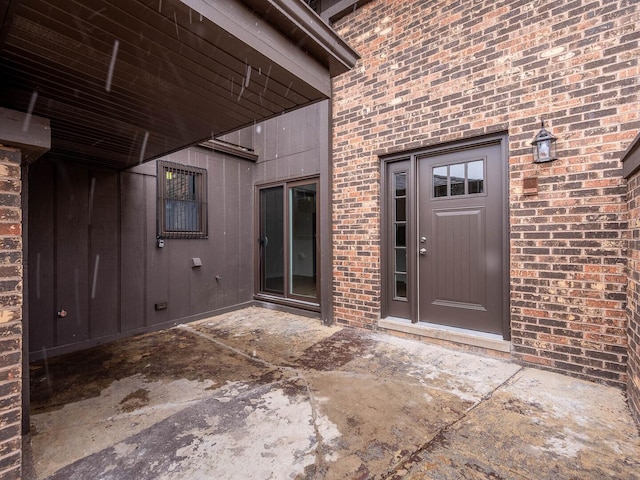 10 Cedar Creek Ct Unit A-10, Palos Heights, IL 60463 - doorway to property featuring brick siding and a patio area