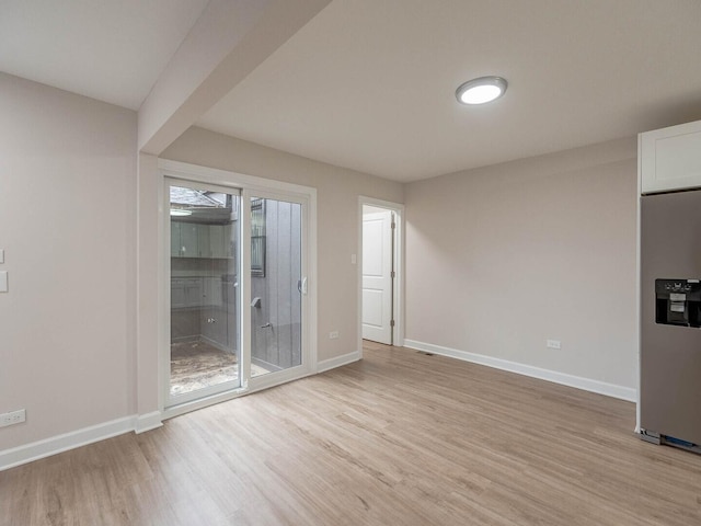 10 Cedar Creek Ct Unit A-10, Palos Heights, IL 60463 - spare room featuring light wood-style floors and baseboards
