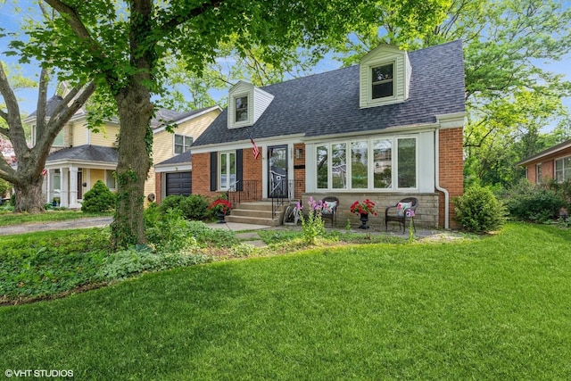 1037 Cedar Ln, Northbrook, IL 60062 - cape cod-style house with a front lawn, roof with shingles, brick siding, and a garage