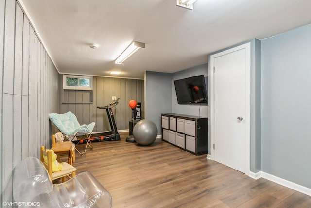 1037 Cedar Ln, Northbrook, IL 60062 - sitting room with wood finished floors, baseboards, and wooden walls