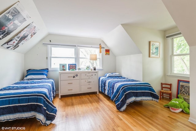 1037 Cedar Ln, Northbrook, IL 60062 - bedroom with hardwood / wood-style floors and lofted ceiling