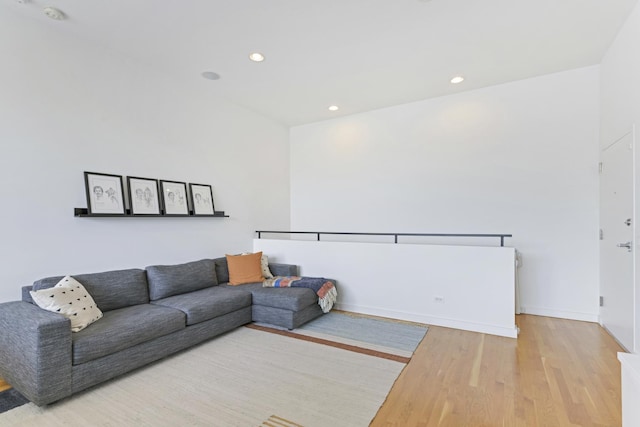1615 N Wolcott Ave Unit 204, Chicago, IL 60622 - living room with wood finished floors, recessed lighting, and baseboards