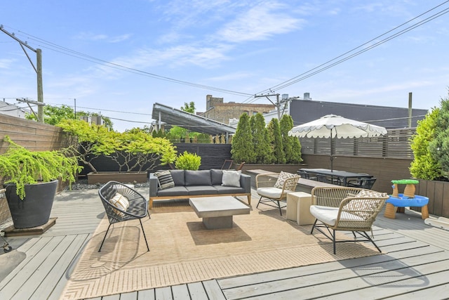 1615 N Wolcott Ave Unit 204, Chicago, IL 60622 - wooden deck with a fenced backyard and an outdoor hangout area