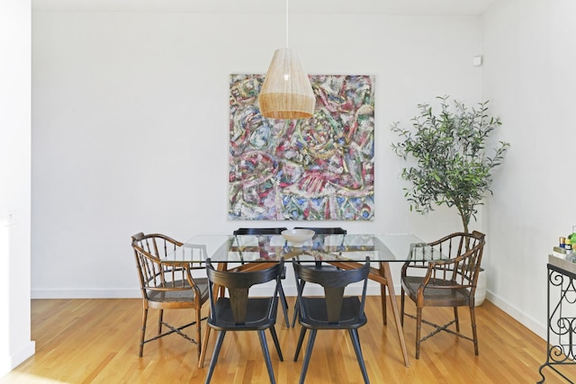 1615 N Wolcott Ave Unit 204, Chicago, IL 60622 - dining area with wood finished floors and baseboards