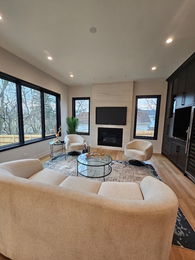299 Cottage Ave, Glen Ellyn, IL 60137 - living area with light wood-style flooring, recessed lighting, baseboards, and a fireplace