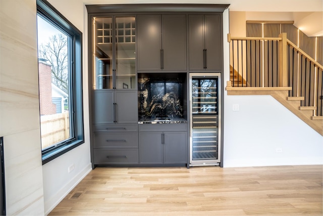 299 Cottage Ave, Glen Ellyn, IL 60137 - bar featuring wine cooler, plenty of natural light, and light wood finished floors