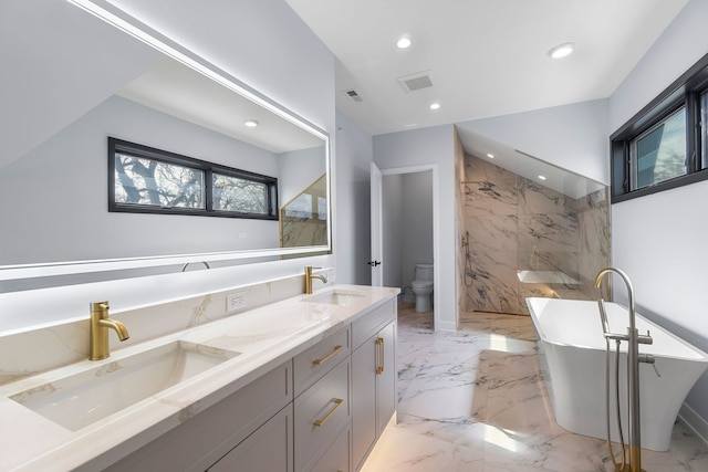 299 Cottage Ave, Glen Ellyn, IL 60137 - full bathroom with recessed lighting, marble tiled floors, healthy amount of natural light, toilet, and double vanity