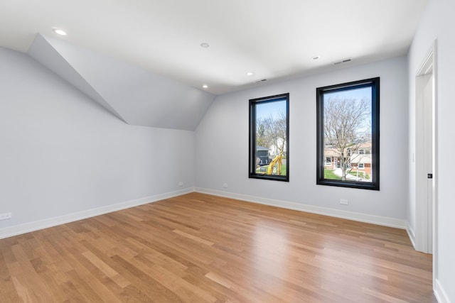 299 Cottage Ave, Glen Ellyn, IL 60137 - additional living space featuring light wood-type flooring, recessed lighting, baseboards, and lofted ceiling