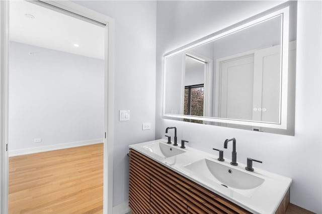 299 Cottage Ave, Glen Ellyn, IL 60137 - full bathroom with double vanity and wood finished floors