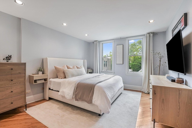 706 W Melrose Ave Unit 3, Chicago, IL 60657 - bedroom featuring recessed lighting, baseboards, and light wood-type flooring