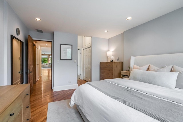 706 W Melrose Ave Unit 3, Chicago, IL 60657 - bedroom featuring wood finished floors, recessed lighting, baseboards, and a closet