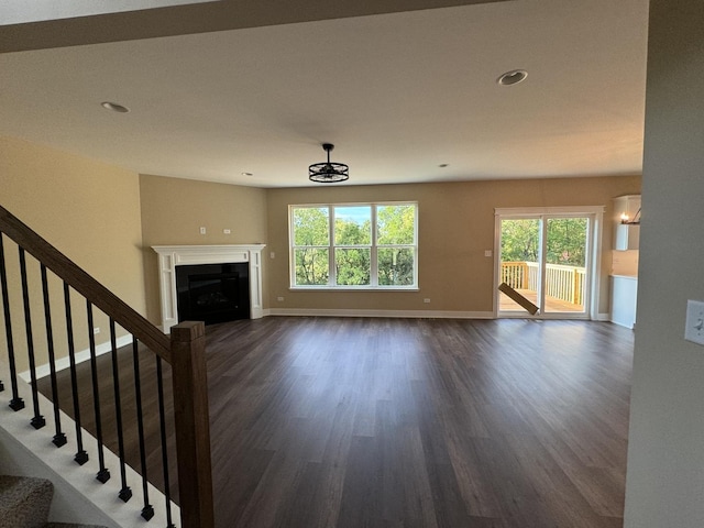 15937 Orchid Ln, Lockport, IL 60441 - unfurnished living room with dark wood-type flooring, healthy amount of natural light, a fireplace, stairway, and recessed lighting