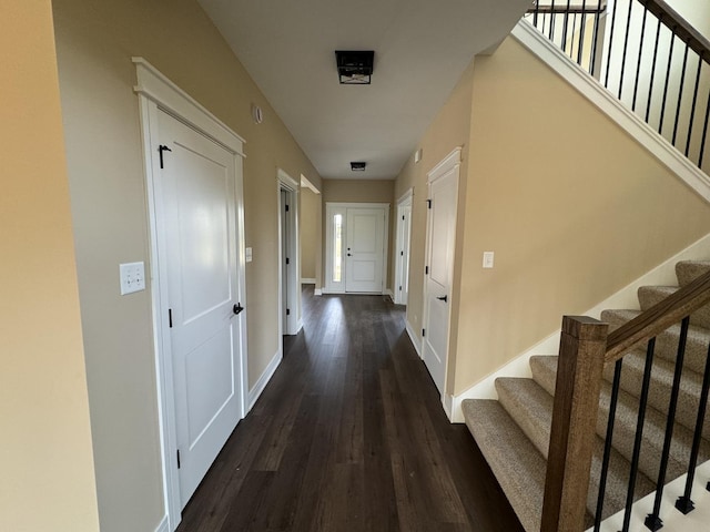 15937 Orchid Ln, Lockport, IL 60441 - corridor with dark wood finished floors, stairs, and baseboards