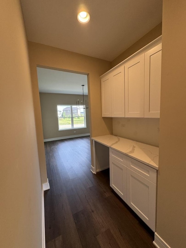 15937 Orchid Ln, Lockport, IL 60441 - hallway featuring dark wood-type flooring, baseboards, recessed lighting, and a chandelier