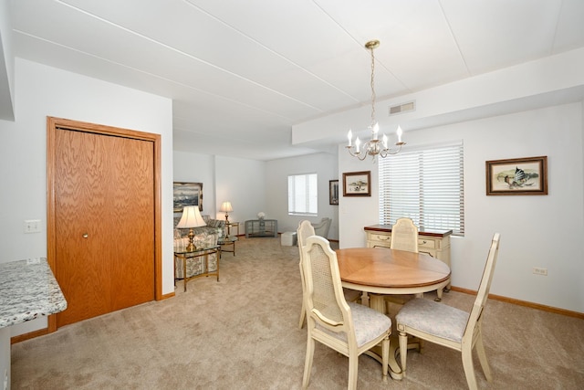 1500 S Ardmore Ave Unit 310, Villa Park, IL 60181 - dining space with light colored carpet, a chandelier, and baseboards