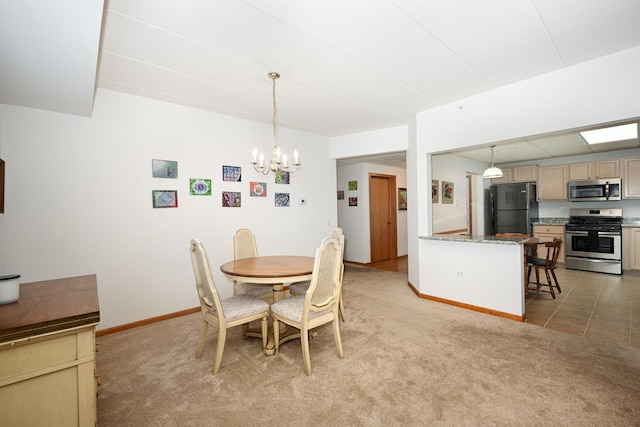 1500 S Ardmore Ave Unit 310, Villa Park, IL 60181 - dining area featuring a chandelier, light colored carpet, and baseboards