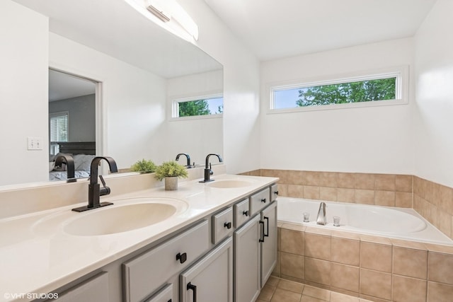 0N611 W Weaver Cir, Geneva, IL 60134 - full bath featuring ensuite bath, a garden tub, double vanity, and tile patterned flooring