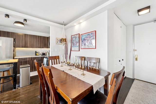 655 W Irving Park Rd Unit 2903, Chicago, IL 60613 - dining space featuring dark wood-style flooring
