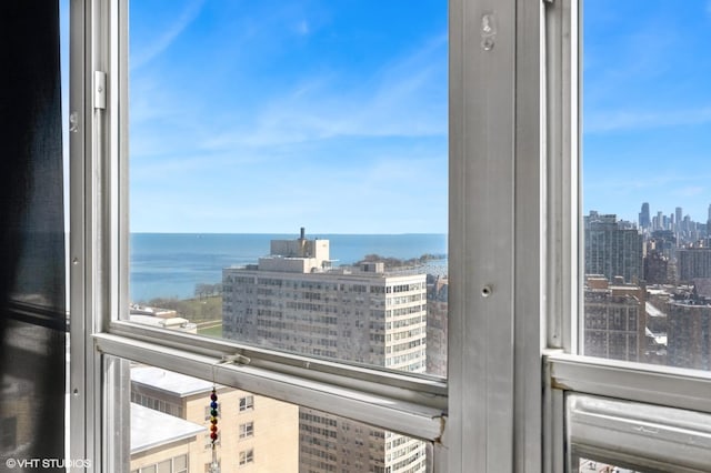655 W Irving Park Rd Unit 2903, Chicago, IL 60613 - interior space featuring a skyline view and a water view