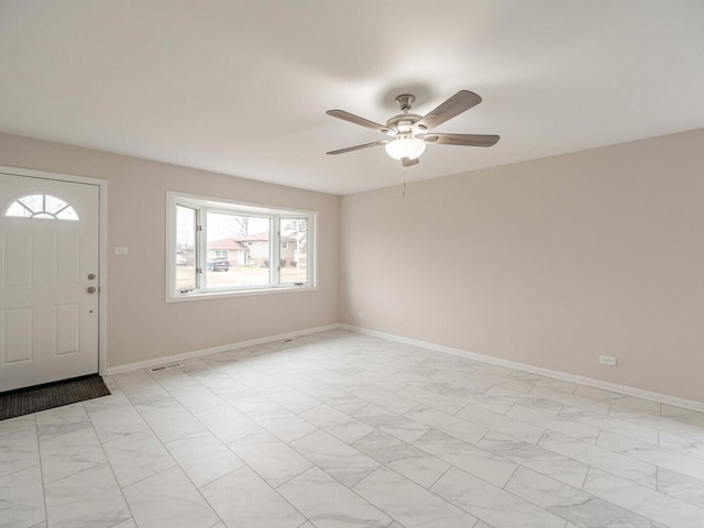 640 Enterprise Rd, Chicago Heights, IL 60411 - foyer entrance featuring ceiling fan, baseboards, and light marble finish floors