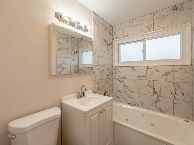 640 Enterprise Rd, Chicago Heights, IL 60411 - bathroom with vanity, toilet, and a combined bath / shower with jetted tub