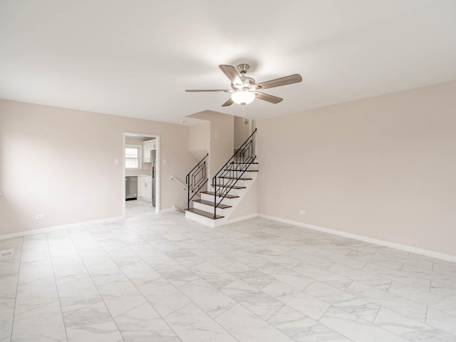 640 Enterprise Rd, Chicago Heights, IL 60411 - unfurnished living room featuring stairway, ceiling fan, and baseboards