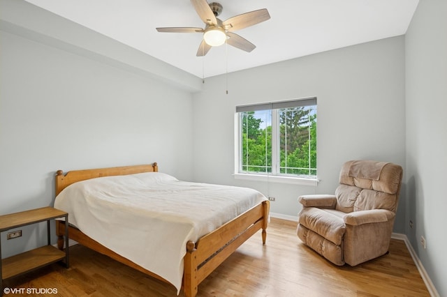 911 Busse Hwy Unit 302, Park Ridge, IL 60068 - bedroom with light wood-style floors, baseboards, and a ceiling fan